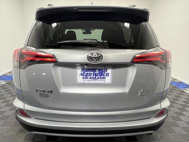 used 2018 Toyota RAV4 car, priced at $23,995