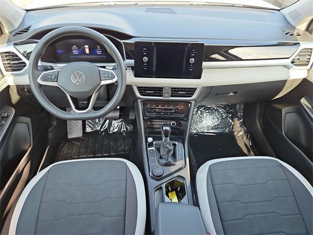 new 2025 Volkswagen Taos car, priced at $29,374