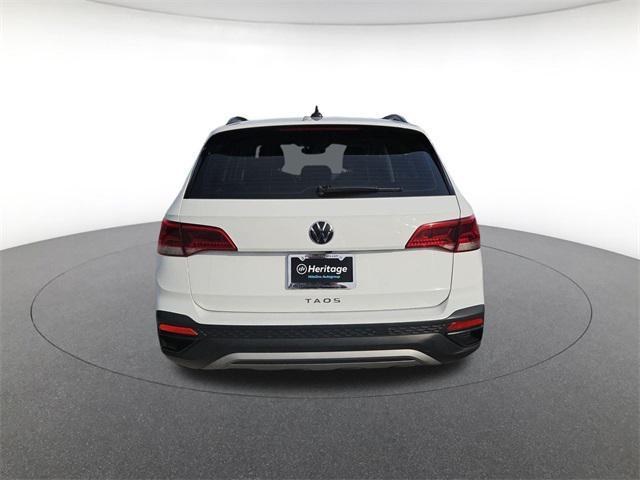 used 2023 Volkswagen Taos car, priced at $18,000