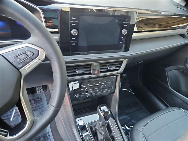 used 2025 Volkswagen Taos car, priced at $29,500