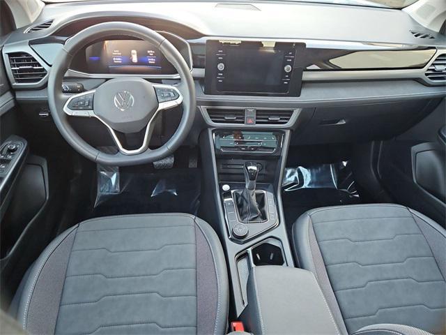 used 2025 Volkswagen Taos car, priced at $29,500