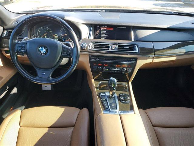 used 2015 BMW 750 car, priced at $16,235