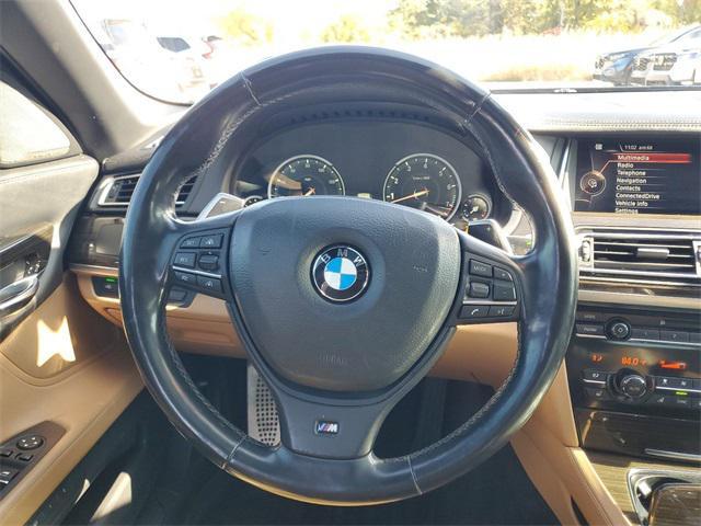 used 2015 BMW 750 car, priced at $16,235