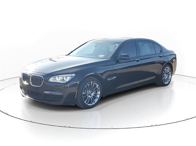 used 2015 BMW 750 car, priced at $16,235