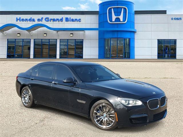 used 2015 BMW 750 car, priced at $16,235