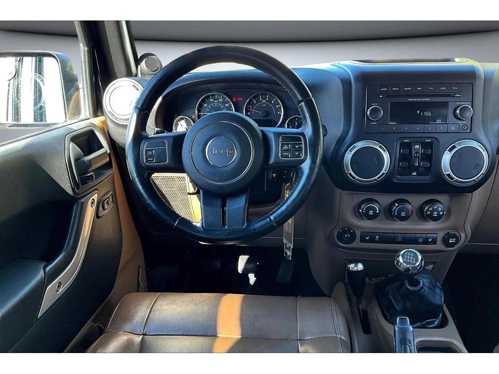 used 2012 Jeep Wrangler Unlimited car, priced at $15,984