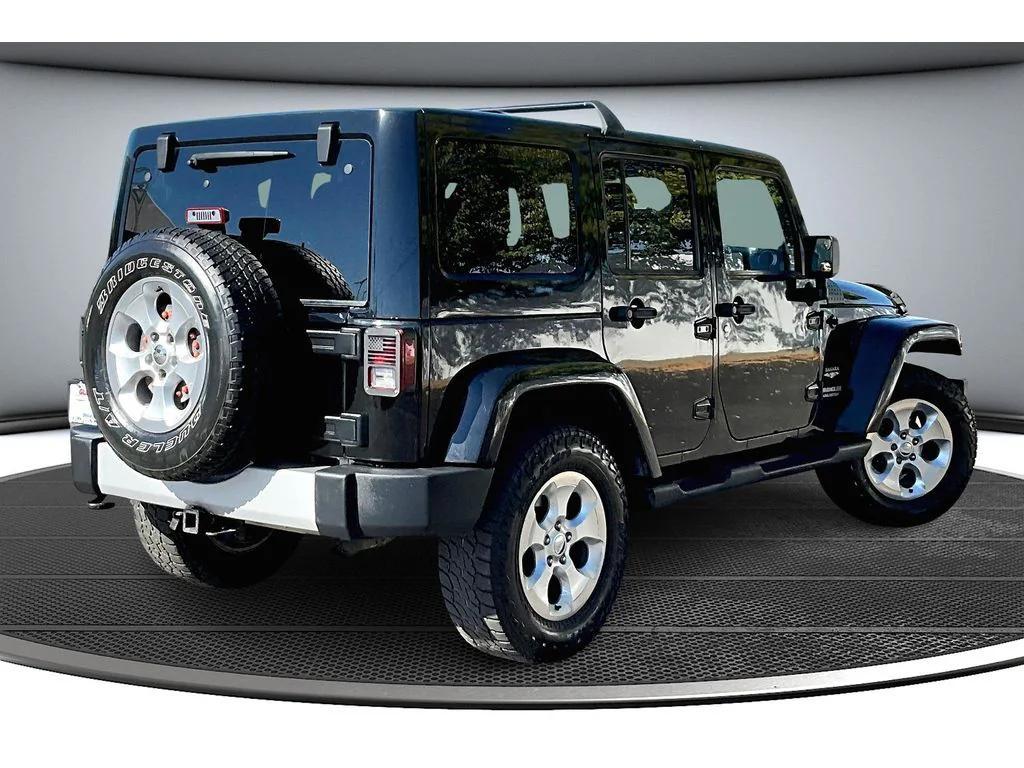 used 2012 Jeep Wrangler Unlimited car, priced at $15,984
