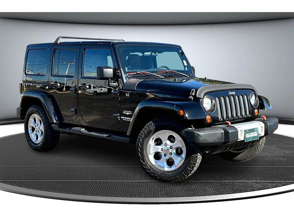 used 2012 Jeep Wrangler Unlimited car, priced at $15,984