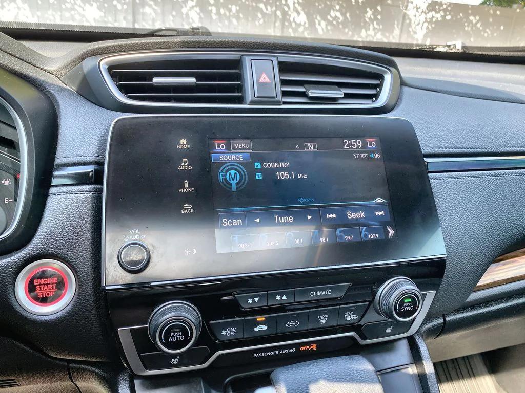 used 2021 Honda CR-V car, priced at $25,000