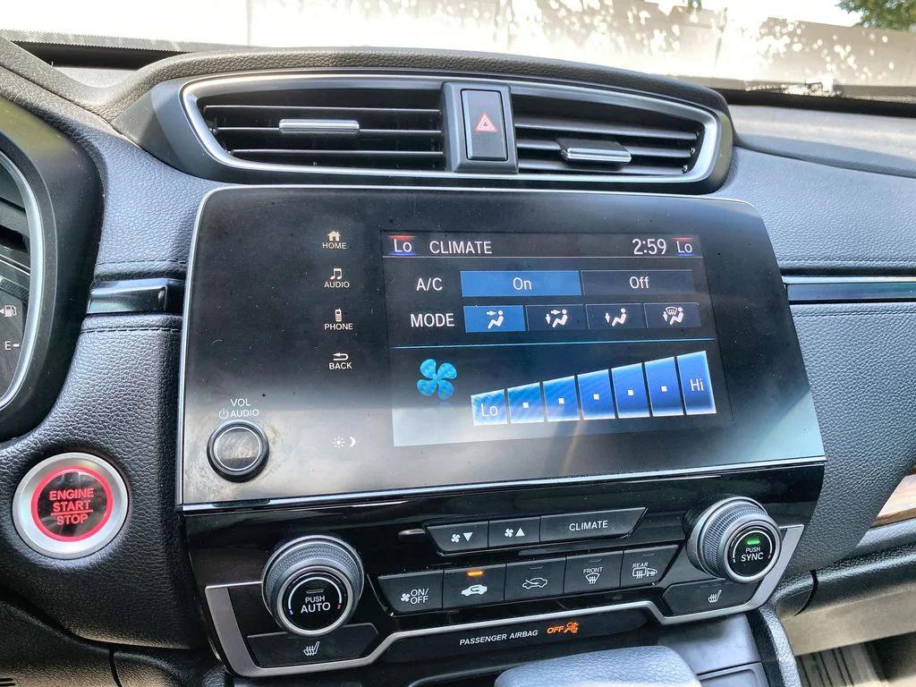 used 2021 Honda CR-V car, priced at $25,000
