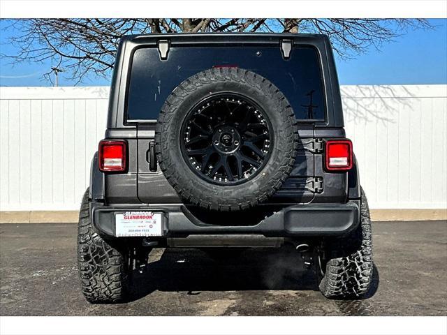 used 2023 Jeep Wrangler car, priced at $33,994