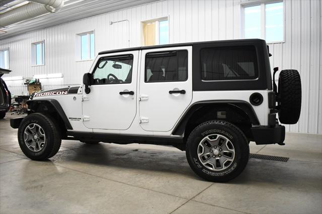 used 2014 Jeep Wrangler Unlimited car, priced at $16,490