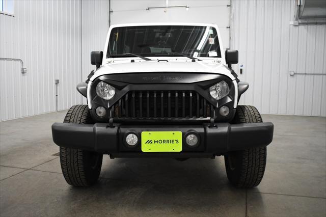 used 2014 Jeep Wrangler Unlimited car, priced at $16,490