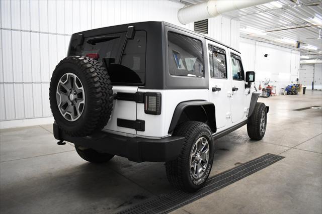 used 2014 Jeep Wrangler Unlimited car, priced at $16,490