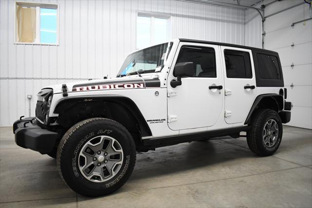 used 2014 Jeep Wrangler Unlimited car, priced at $16,490