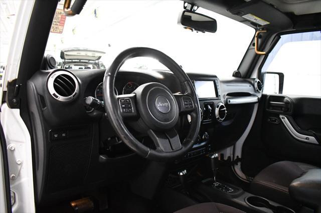 used 2014 Jeep Wrangler Unlimited car, priced at $16,490