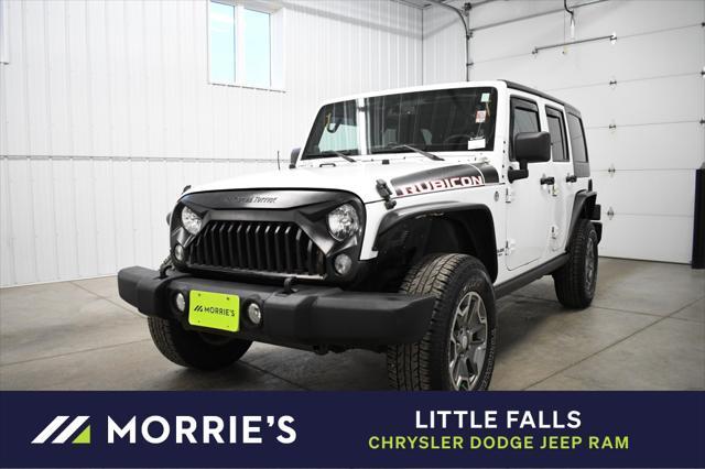 used 2014 Jeep Wrangler Unlimited car, priced at $16,490