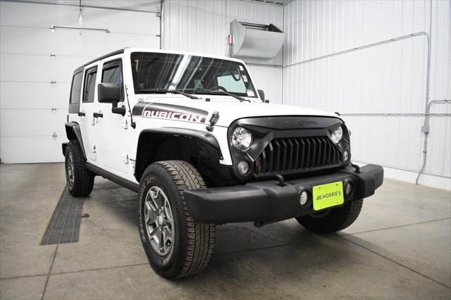 used 2014 Jeep Wrangler Unlimited car, priced at $16,490