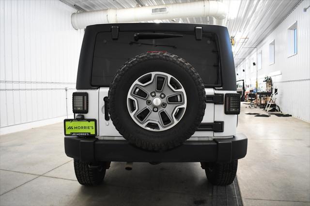 used 2014 Jeep Wrangler Unlimited car, priced at $16,490