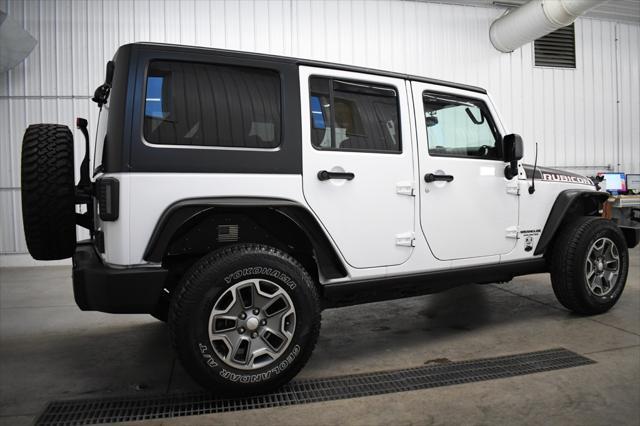 used 2014 Jeep Wrangler Unlimited car, priced at $16,490