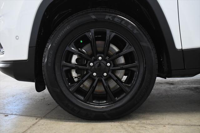 used 2023 Jeep Cherokee car, priced at $24,480
