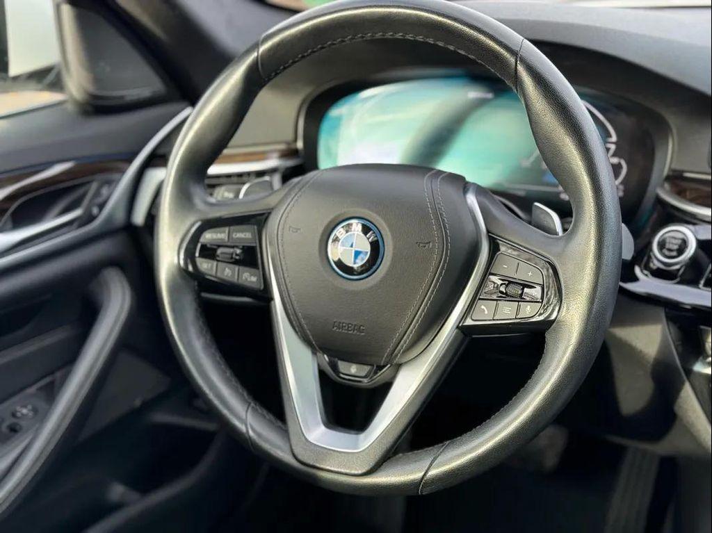 used 2023 BMW 530e car, priced at $31,300