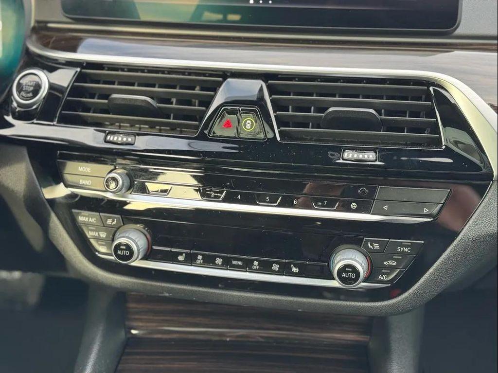 used 2023 BMW 530e car, priced at $31,300