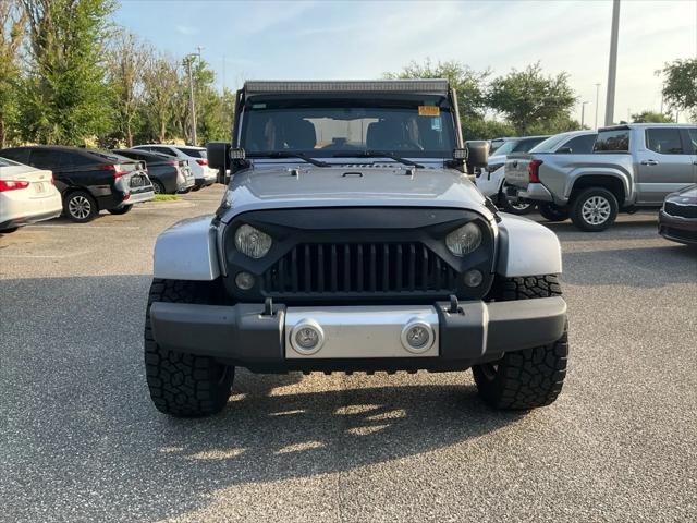 used 2013 Jeep Wrangler Unlimited car, priced at $15,695