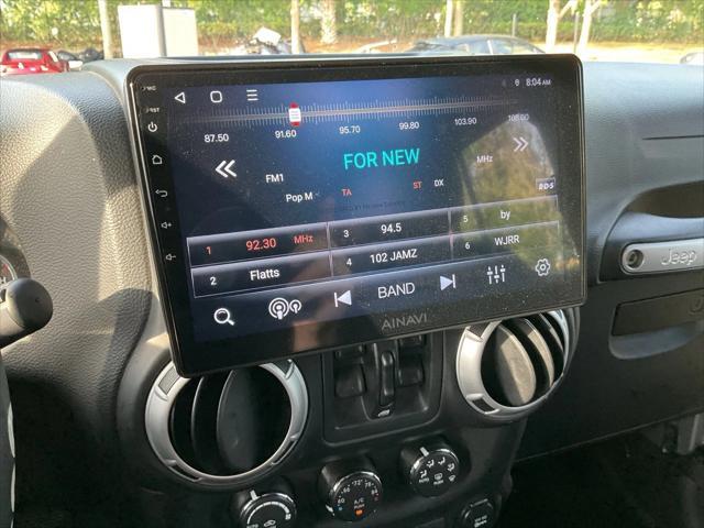 used 2013 Jeep Wrangler Unlimited car, priced at $15,695