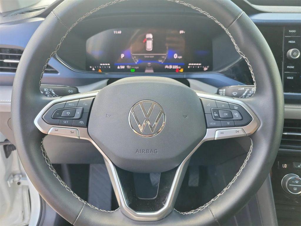 used 2024 Volkswagen Taos car, priced at $19,695