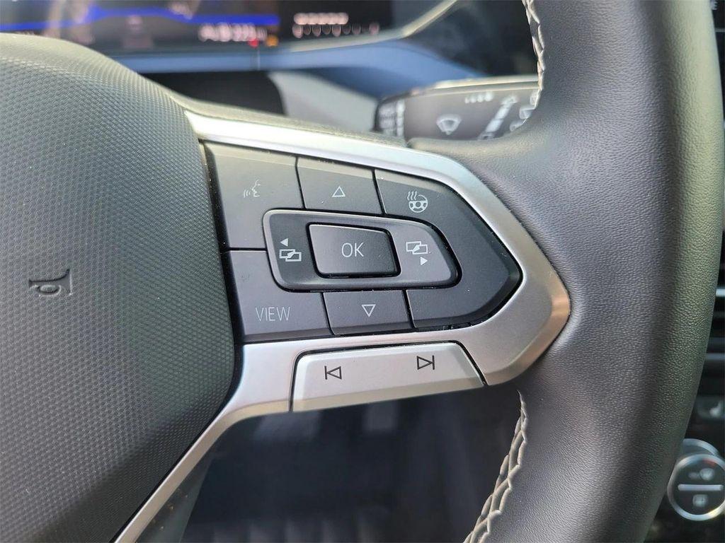 used 2024 Volkswagen Taos car, priced at $19,695