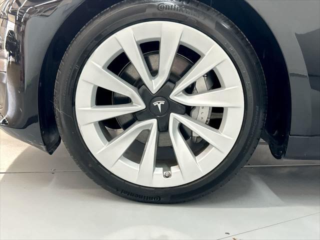 used 2023 Tesla Model 3 car, priced at $28,900