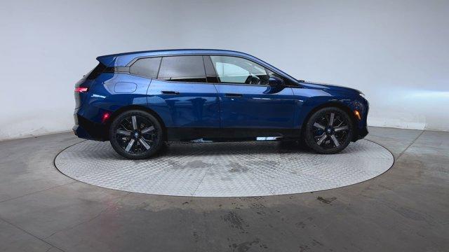 new 2025 BMW iX car, priced at $90,035