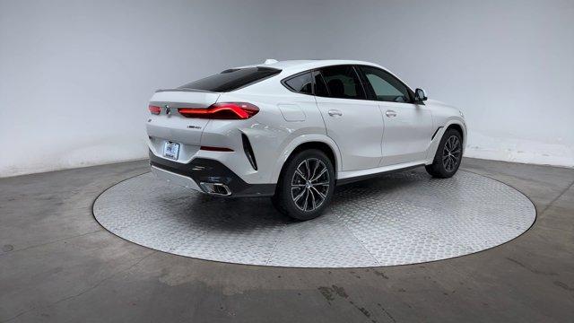 new 2025 BMW X6 car, priced at $73,725