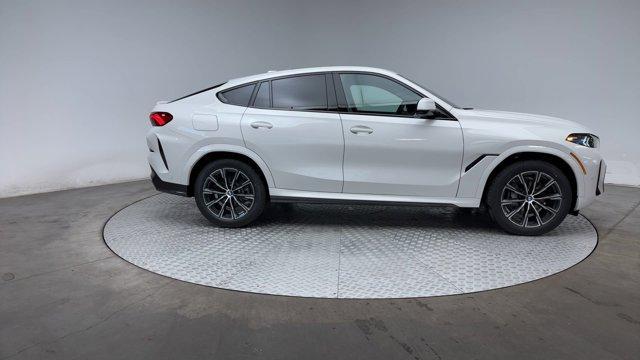 new 2025 BMW X6 car, priced at $73,725