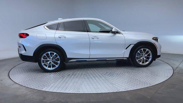 used 2022 BMW X6 car, priced at $53,777