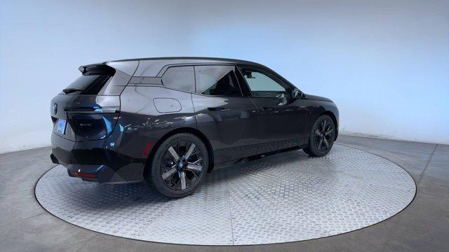 new 2025 BMW iX car, priced at $90,780