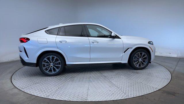 new 2025 BMW X6 car, priced at $83,055