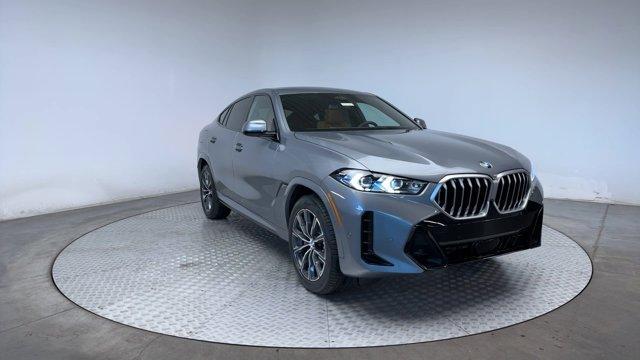 new 2025 BMW X6 car, priced at $76,125