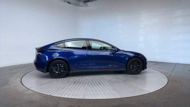 used 2023 Tesla Model 3 car, priced at $25,971
