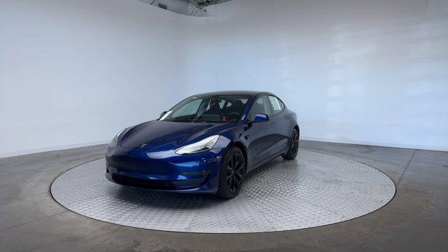 used 2023 Tesla Model 3 car, priced at $25,971
