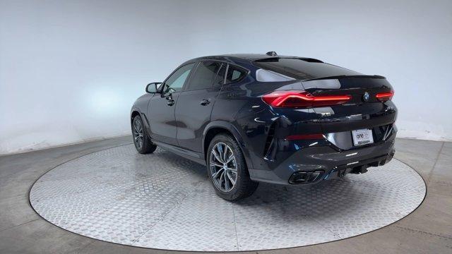 new 2025 BMW X6 car, priced at $105,935