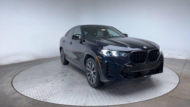 new 2025 BMW X6 car, priced at $105,935