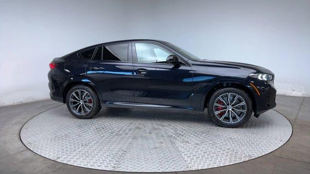 new 2025 BMW X6 car, priced at $105,935