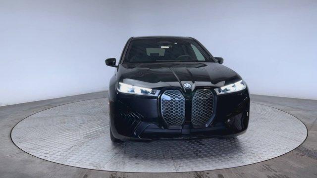 new 2024 BMW iX car, priced at $104,290