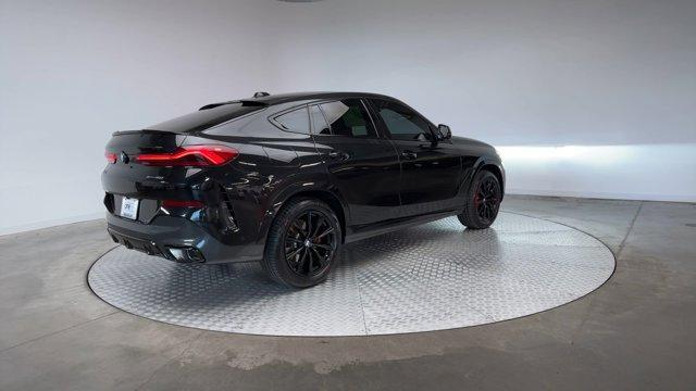 used 2024 BMW X6 car, priced at $68,871