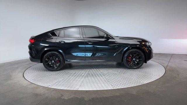 used 2024 BMW X6 car, priced at $68,871