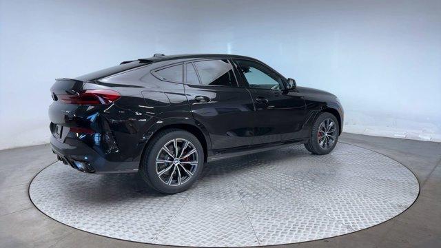 new 2025 BMW X6 car, priced at $83,425