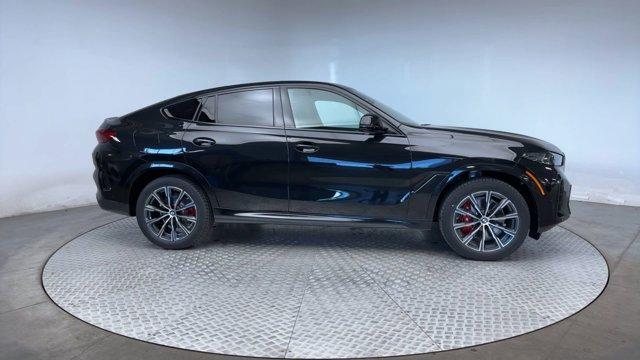 new 2025 BMW X6 car, priced at $83,425