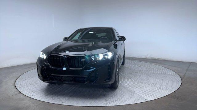 new 2025 BMW X6 car, priced at $103,355